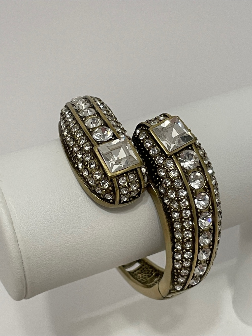 Heidi Daus “Infinite Magic” Oval Clear Crystal Bypass Hinged Bangle